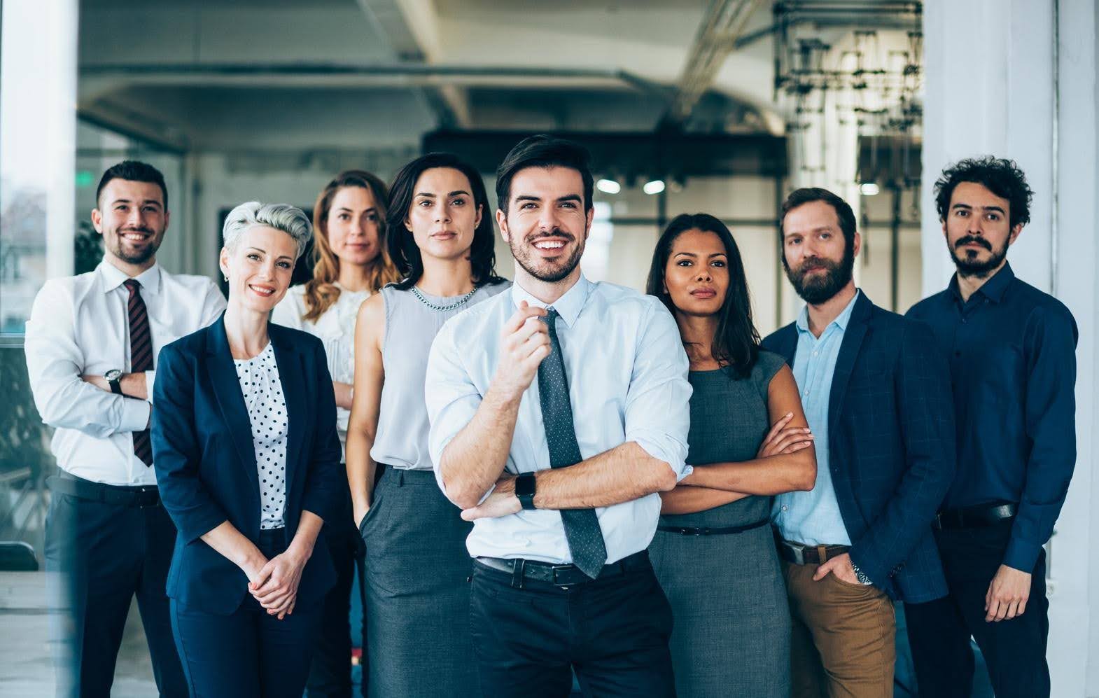 Small business owner working with a virtual assistant to build a stronger team, streamline daily tasks, and support marketing and business growth with TechFellow.