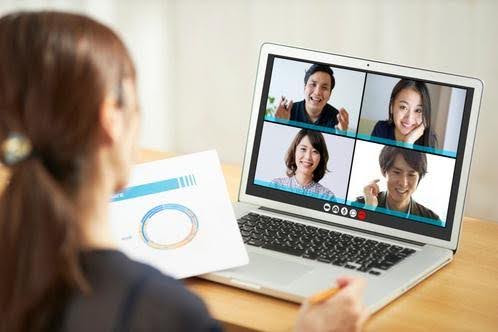 Business professional managing leads through a virtual team meeting as Techfellow helps growing businesses improve operations.